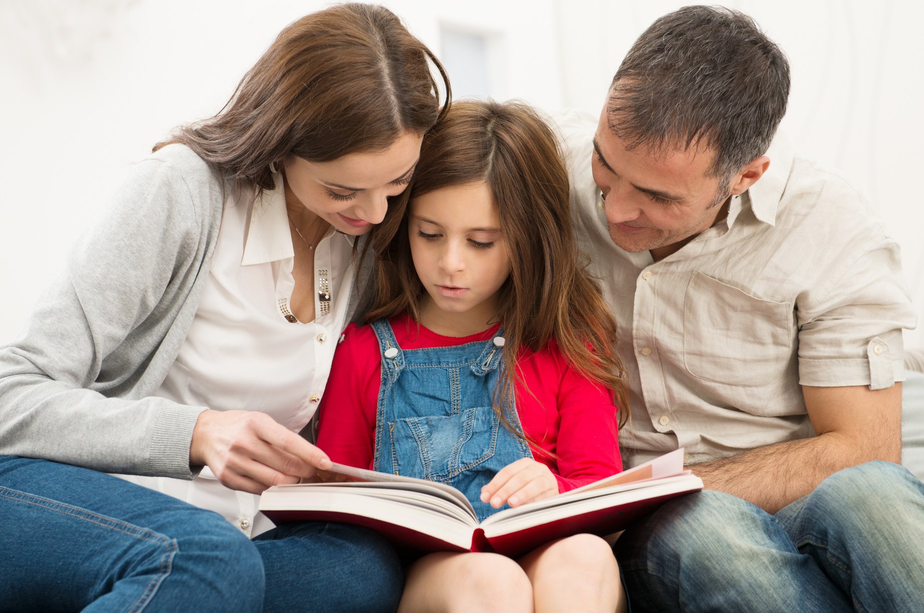 Parents Helping Daughter Study